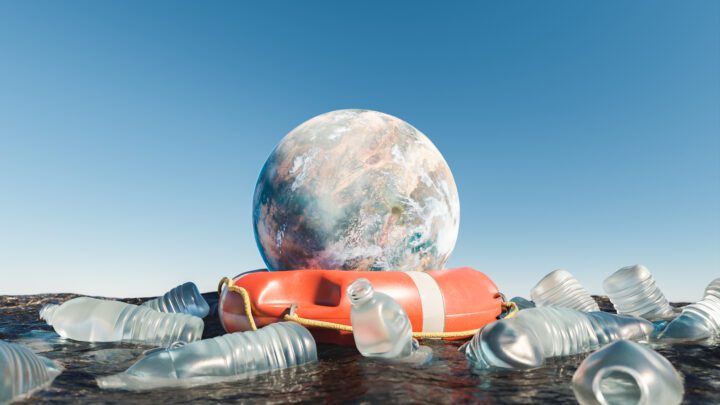 planet with lifebuoy in the ocean surrounded by plastic bottles